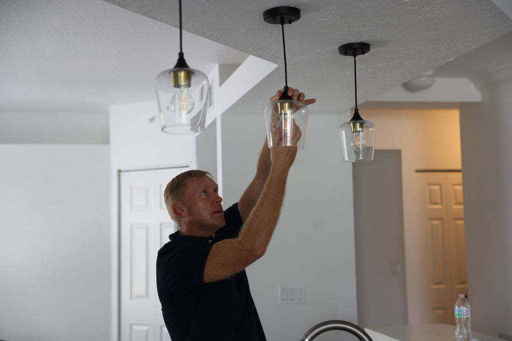 Light fixture installation in Naples, FL kitchen